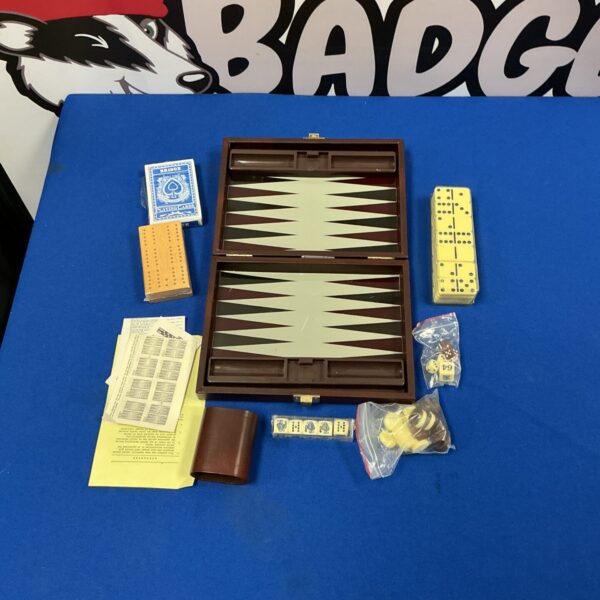 Closed vintage backgammon set with poker cards and chips.