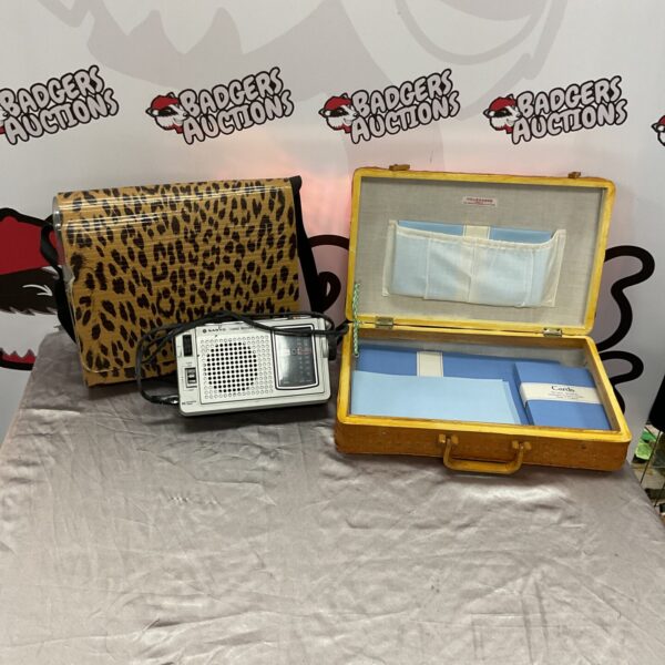 Vintage Baganda handbag with Sanyo radio and wicker basket.