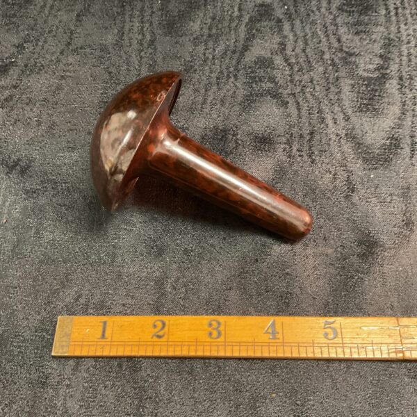 Dark brown vintage Bakelite darning mushroom for sewing repairs.