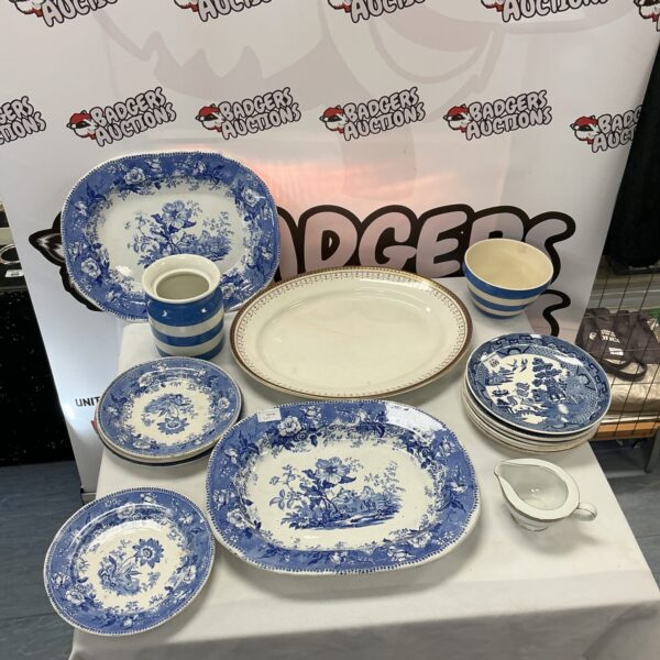 Vintage blue and white pottery selection on display.