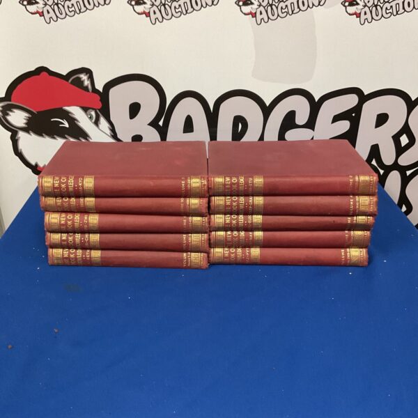 Vintage set of *The New Book of Knowledge* encyclopaedia.