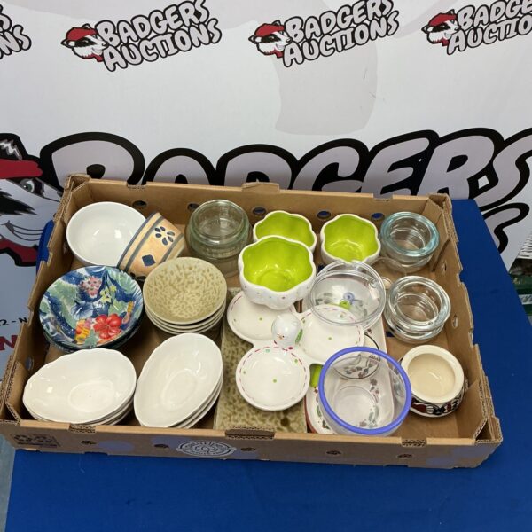 Vintage selection of ceramic and glass bowls and glassware.