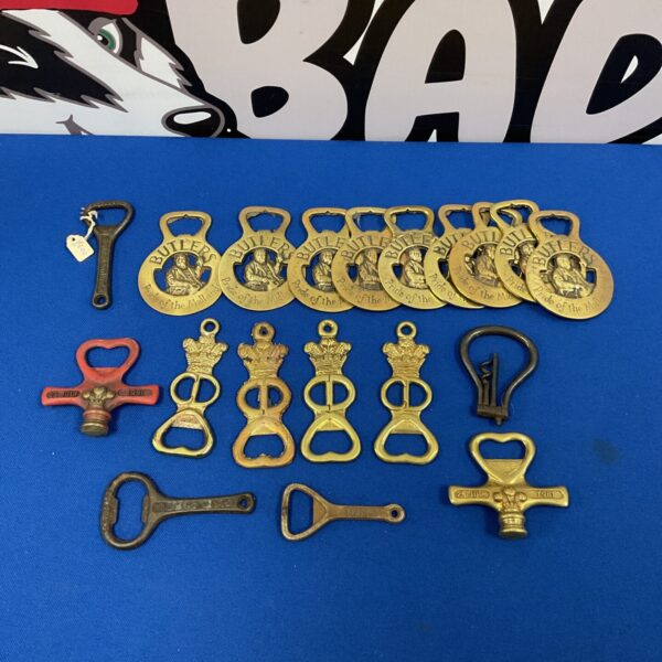 Vintage brass bottle opener lot, including Butler’s and Stapleton designs.