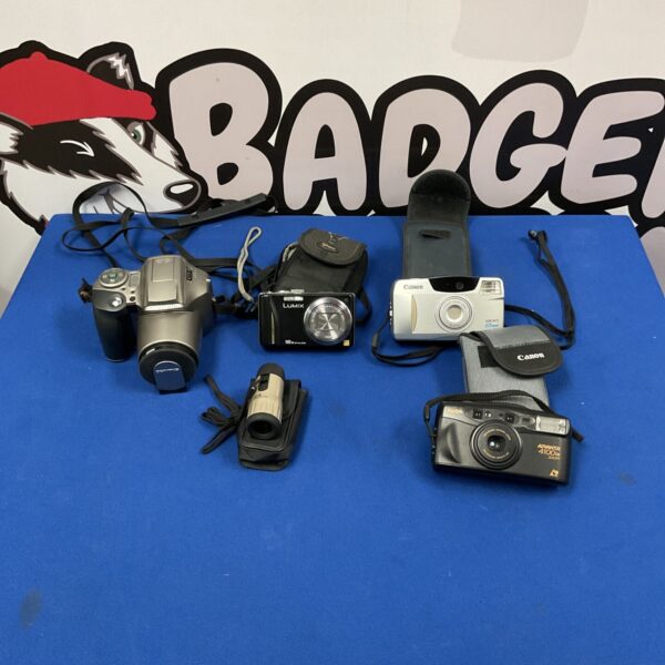 Vintage camera lot including Kodak, Canon, Panasonic, and Olympus models.