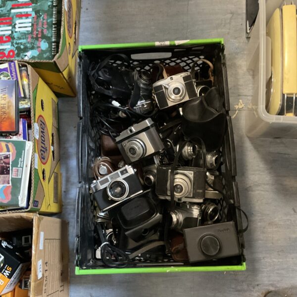 Vintage camera lot including Kodak, Yashica, and Minolta cameras.