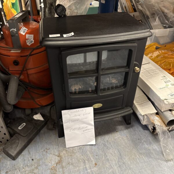 Vintage Canon Sure Shot 35mm camera in used condition.