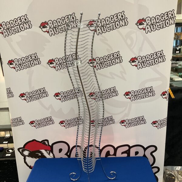 Vintage wooden CD rack for media storage.