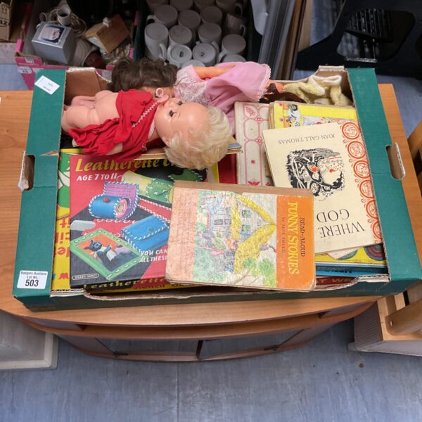 Vintage lot of children's books and dolls for collectors.