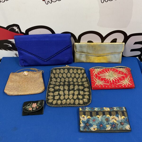 Selection of vintage clutch bags and purses, classic mid-century style.