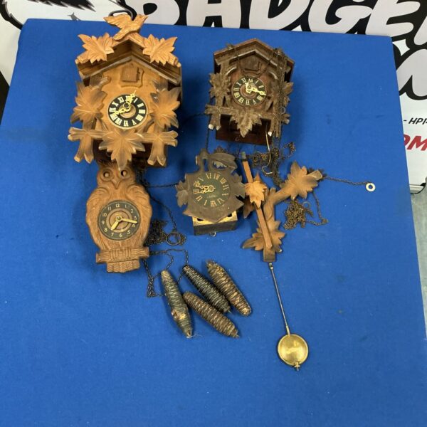 Detailed vintage cuckoo clock with carvings from the Black Forest.