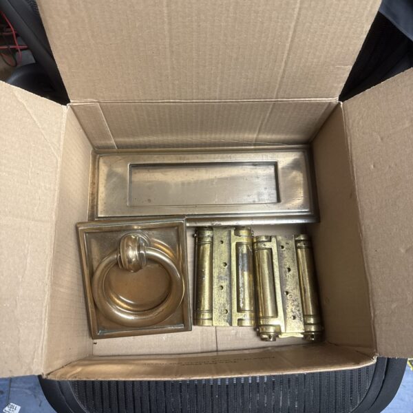 Vintage door hardware lot with brass hinges and letterbox.