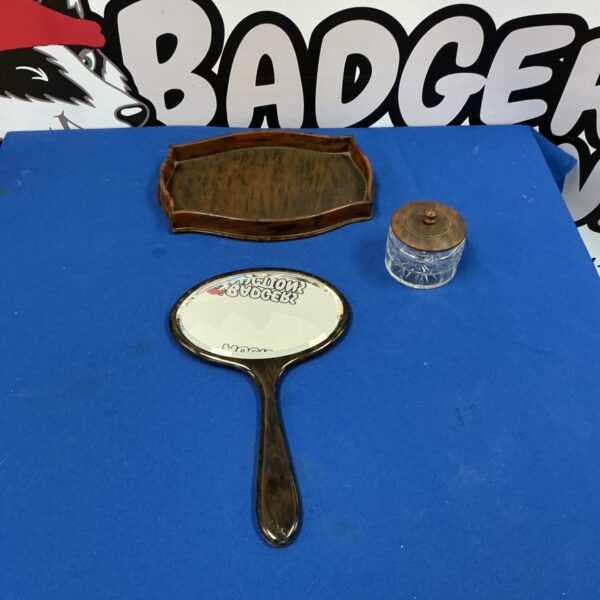 Vintage dressing table set with wooden mirror and tray.