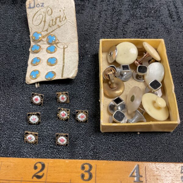 Vintage enamel stud buttons and collar studs in a box.