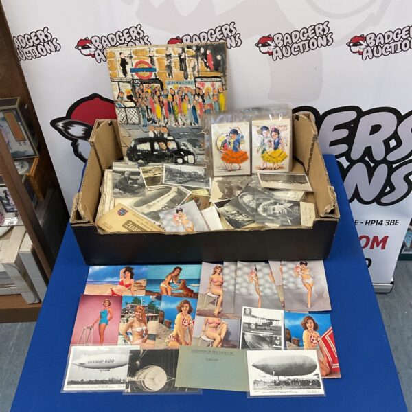 Vintage ephemera lot with antique photographs and postcards.