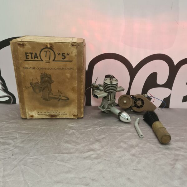 Vintage ETA 5" miniature compression engine in original box.