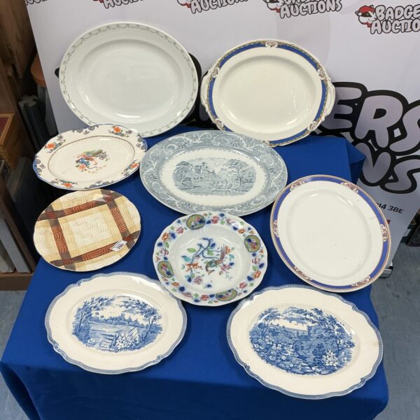 Large quantity of vintage floral serving platters for collectors.