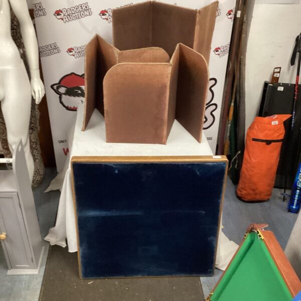 Vintage folding card table with green felt and leather dividers.