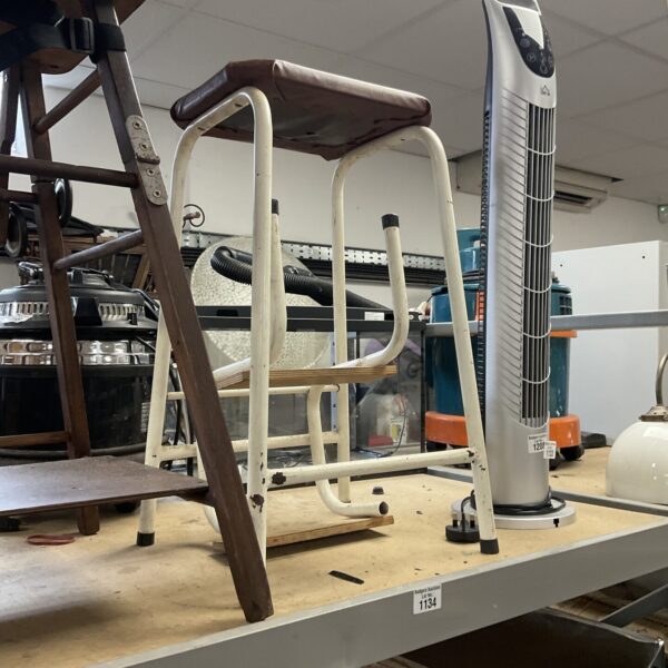 Vintage folding kitchen step stool with enamel finish.