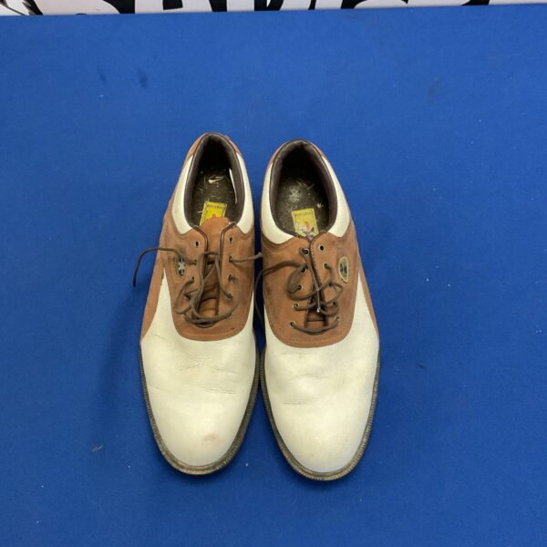 Side view of vintage Footjoy Astro golf boots, classic golf footwear.