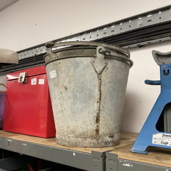 Vintage galvanised metal bucket, showing signs of wear.