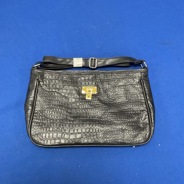 Vintage faux crocodile handbag from the 1960s.