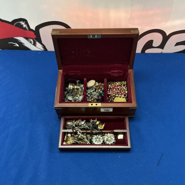 Vintage jewellery chest with a mixed lot of necklaces and bracelets.