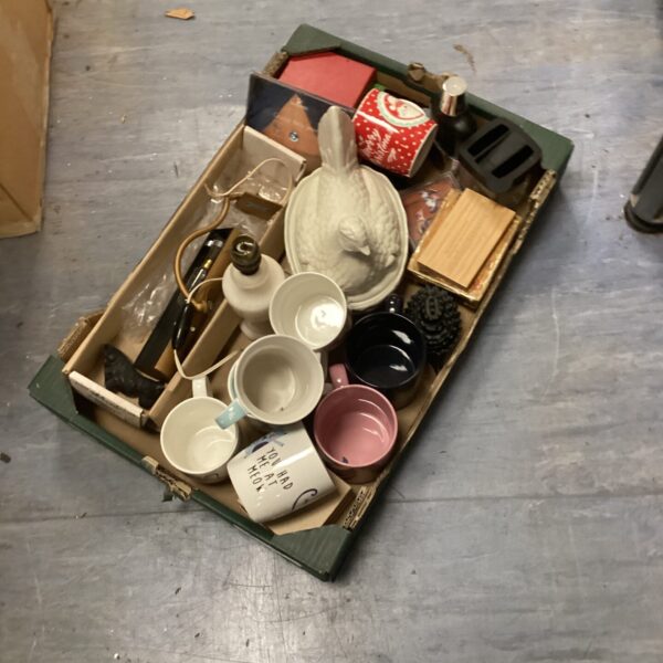 Vintage kitchenalia lot featuring mugs and an egg basket.
