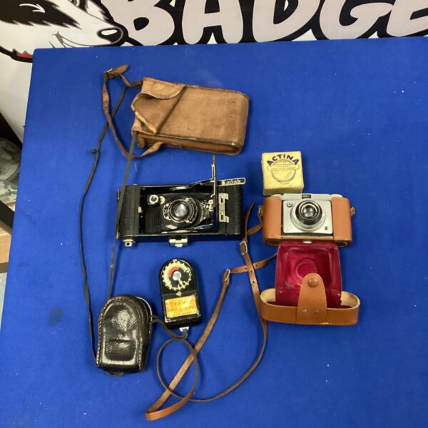 Vintage Kodak and Vario cameras with Actina filter and Weston meter.