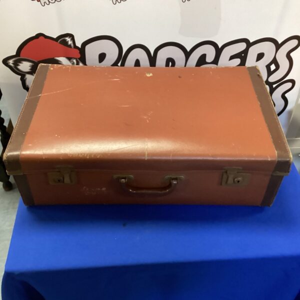 Vintage brown leather travel case with metal corner protectors.