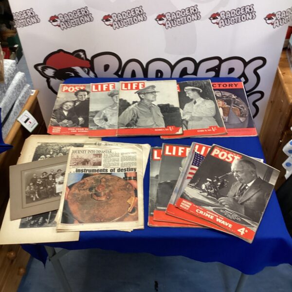 Vintage magazine collection featuring Picture Post and Life magazines.