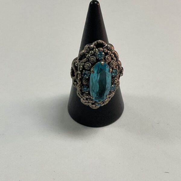 Vintage marcasite ring with a blue stone, size M.