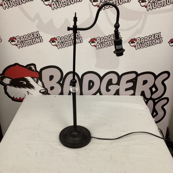 Vintage metal table lamp with adjustable arm.