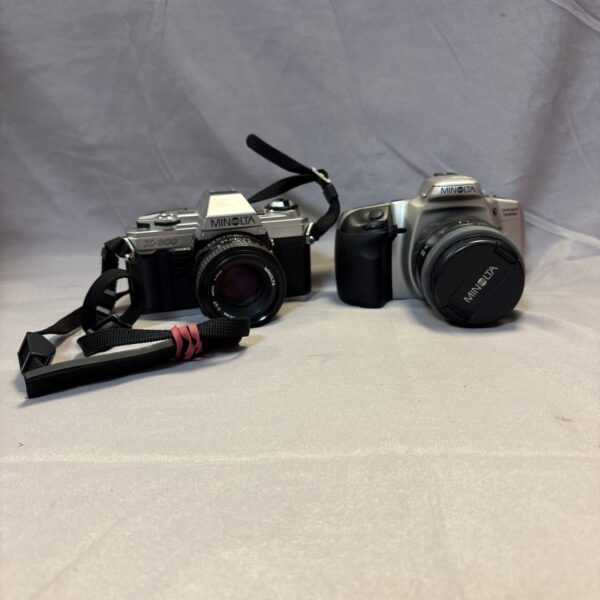 Vintage Minolta XD-11 camera with strap, retro photography.
