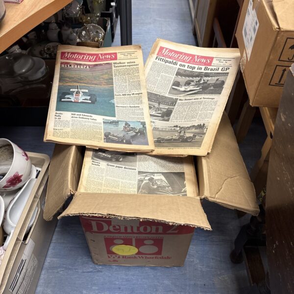 Lot of vintage motoring magazines, including Formula One coverage.