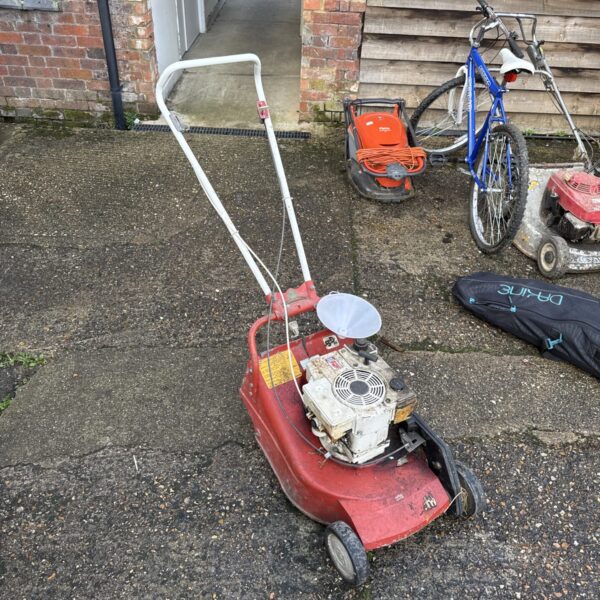 Vintage Mountfield M3S petrol mower in used condition.