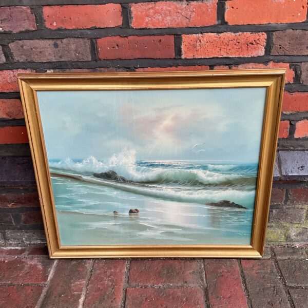 Vintage oil painting of a dramatic seascape with crashing waves.