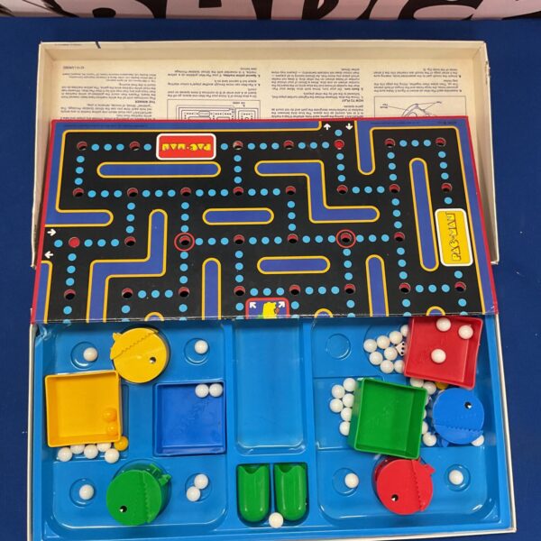 Vintage Pac-Man board game by Milton Bradley, colourful maze design.