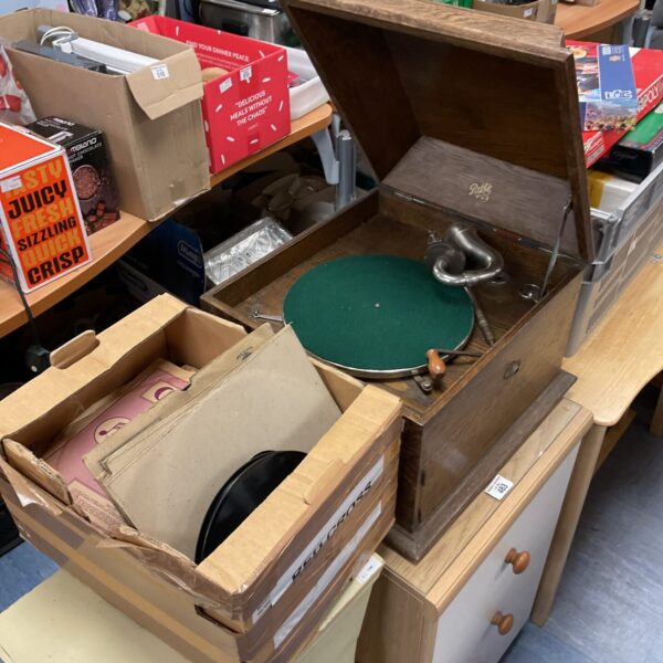 Vintage Pathe gramophone with a box of records for collectors.