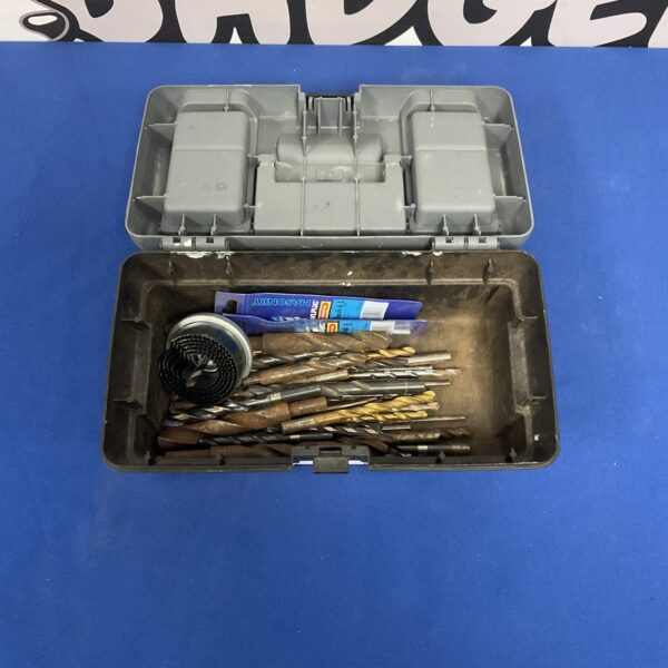 Vintage plastic toolbox with drill bits inside, ideal for DIY projects.