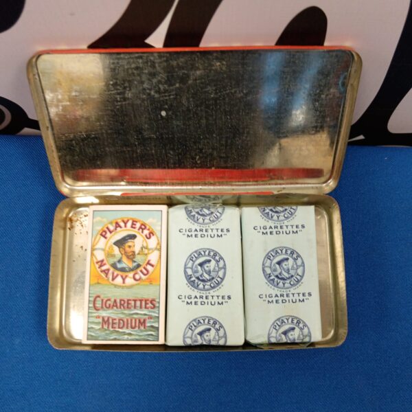 Vintage pack of Players Navy Cut Medium cigarettes, collectible tobacco advertising.