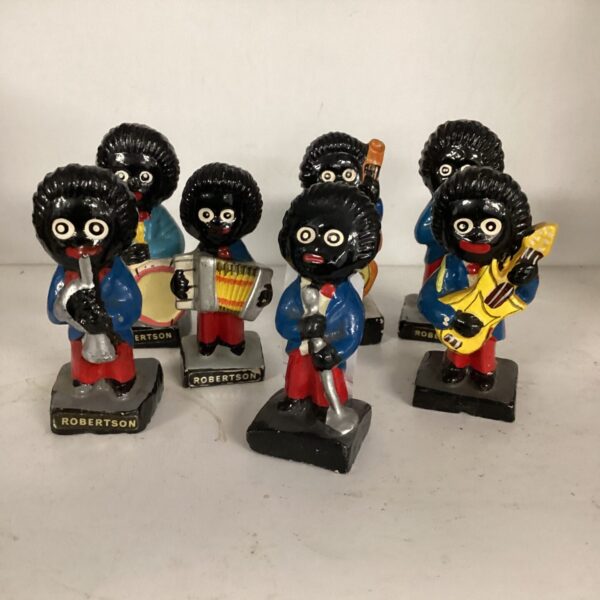 Vintage Robinson golly band figures playing instruments.