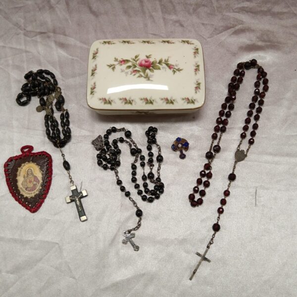 Vintage rosary beads with B K S crucifix and leather patch.