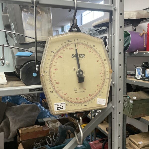 Vintage Salter hanging scales with a clear dial for weighing.