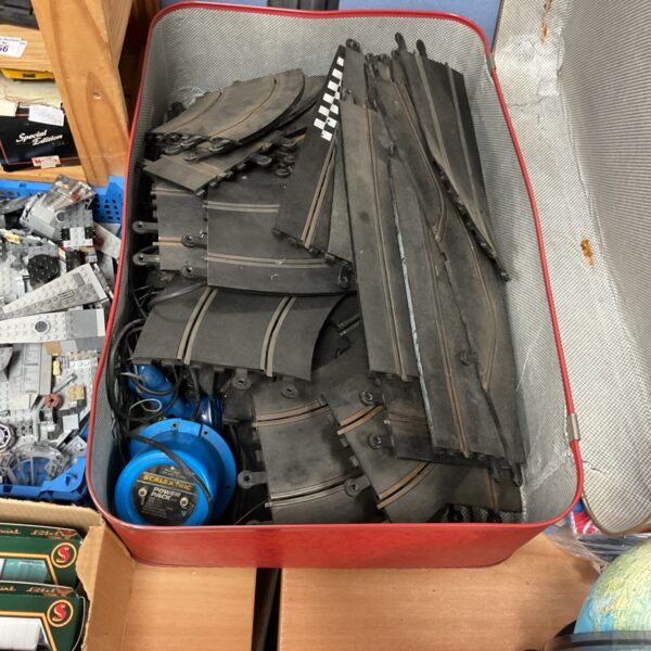 Vintage Scalextric track set with power unit, 1960s model racing.