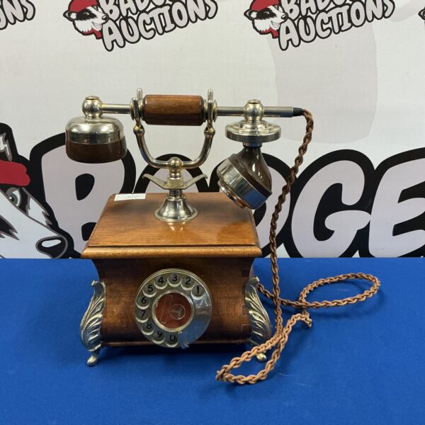 Vintage Schooner rotary telephone, wall mounted, antique communication device.