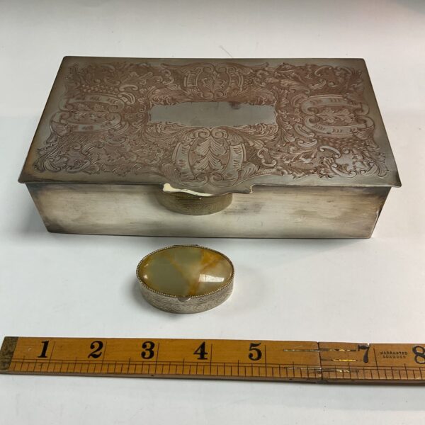 Vintage silver plate cigarette and pill box set with embossed details.
