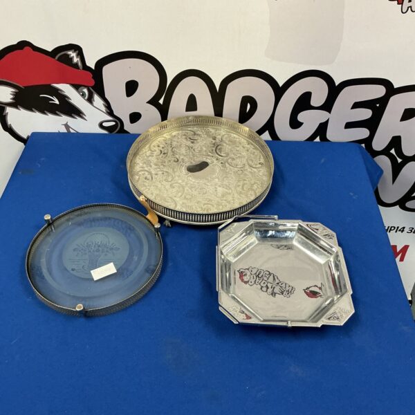 Vintage silver plate cake tray with floral design.