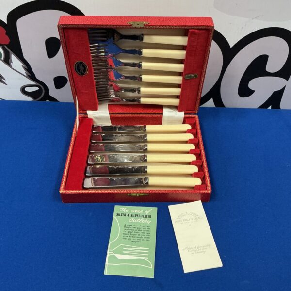 Vintage silver plate cutlery set in a fitted case.