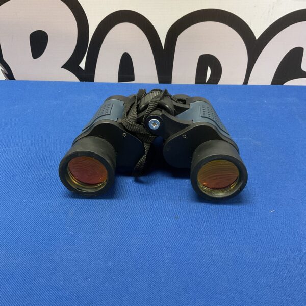 Vintage Skywindow 60x60 binoculars with coated optics, side view.