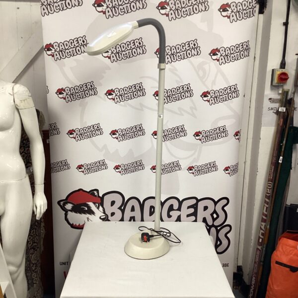 Vintage adjustable standard lamp with flexible head.